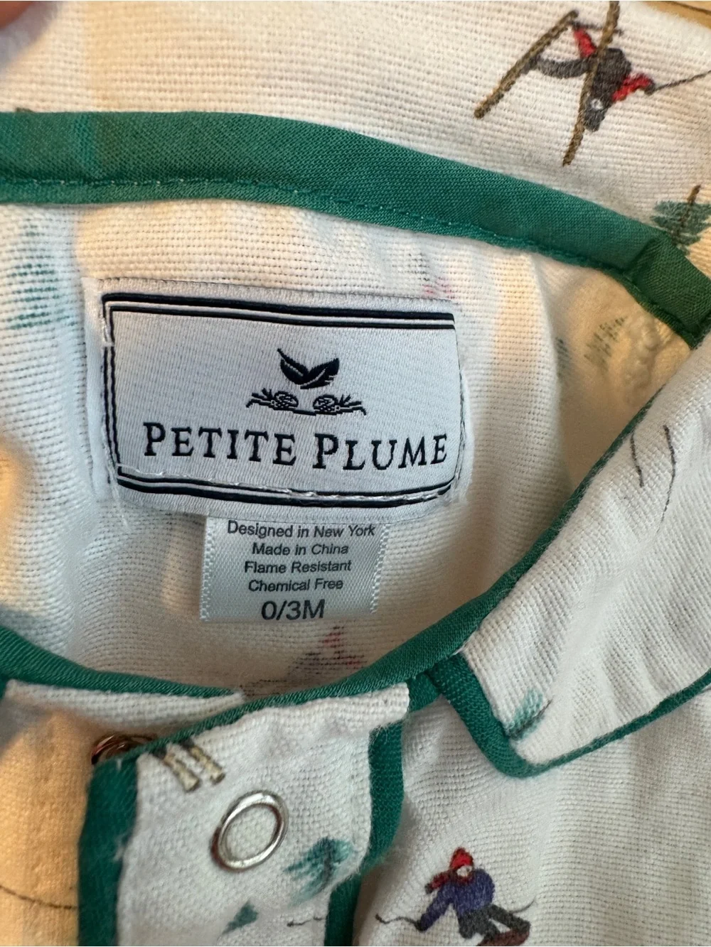 Petit Plume White Ski-Print Baby Pajamaswith Green Trim